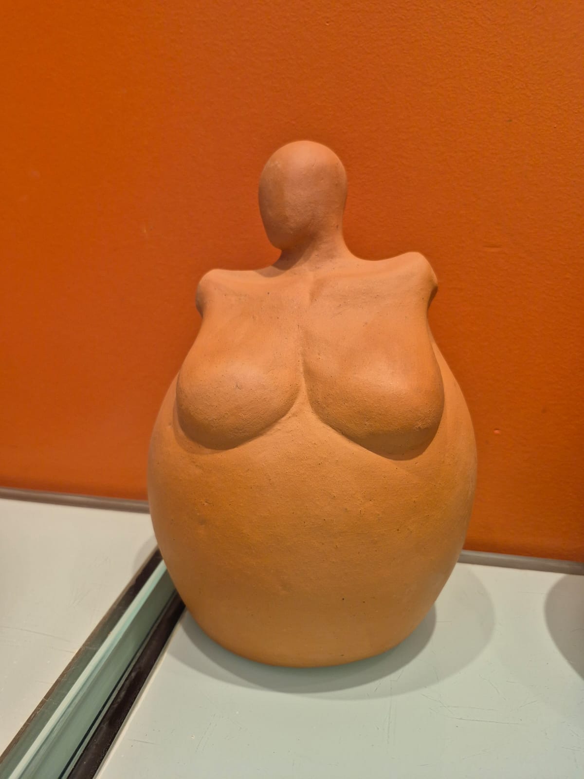 GORDINHA SEM BRAÇO